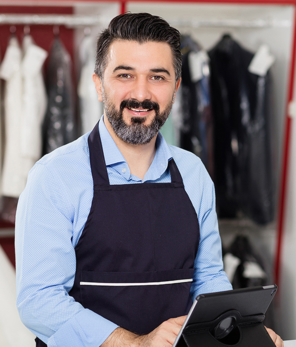 smiling owner of cleaning business