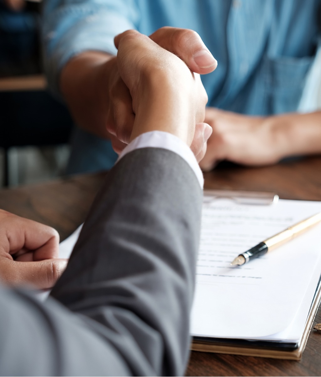 Real estate agent and client closing on new home